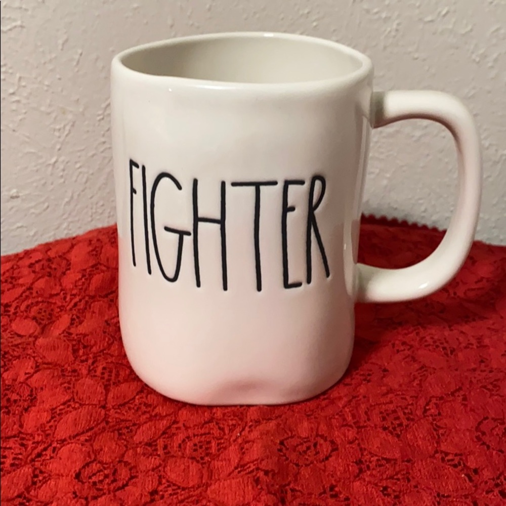 Rae Dunn mug with “Fighter” text